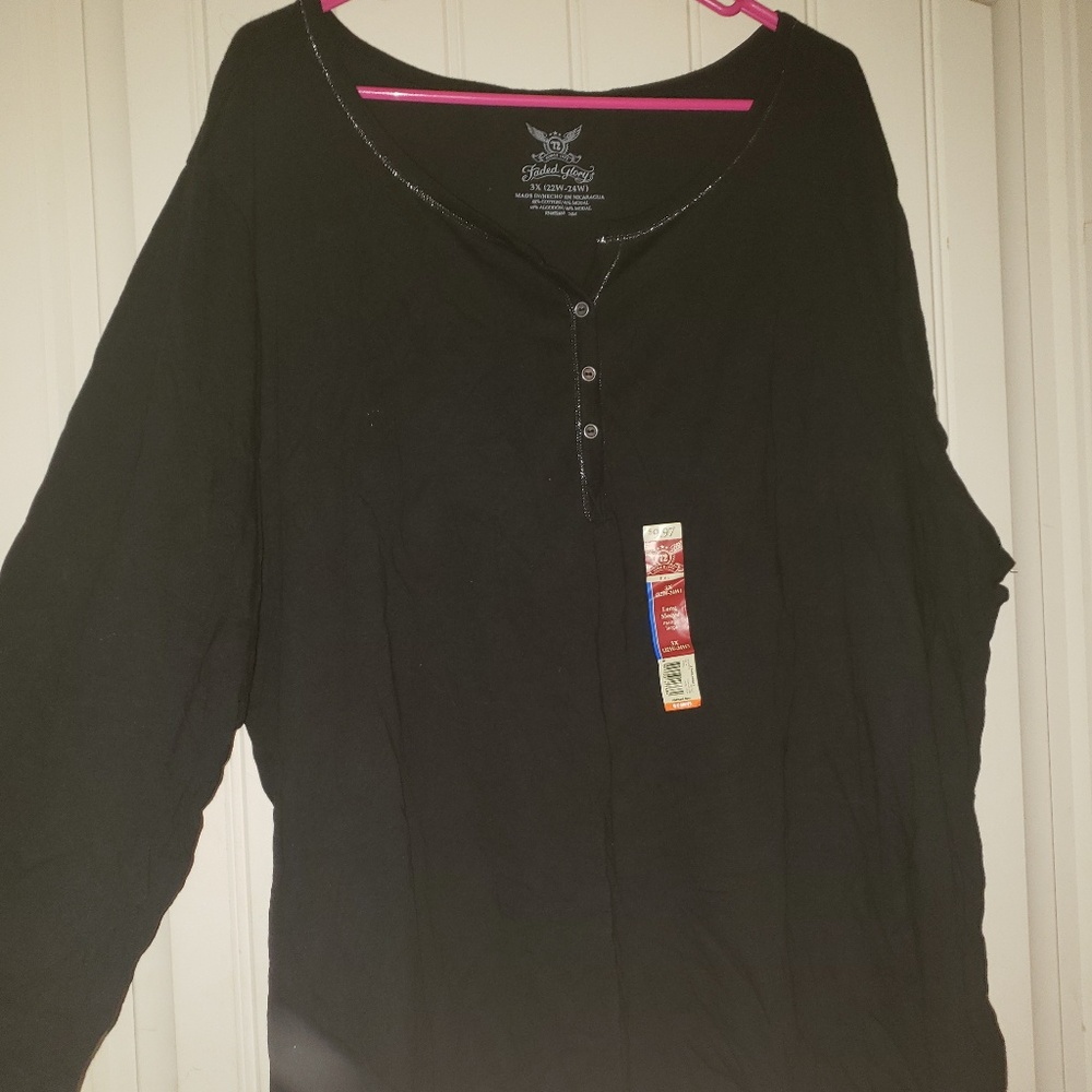 Black long sleeve shirt with buttons.